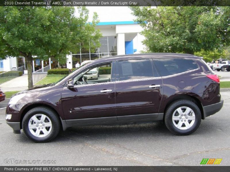 Dark Cherry Metallic / Dark Gray/Light Gray 2010 Chevrolet Traverse LT AWD