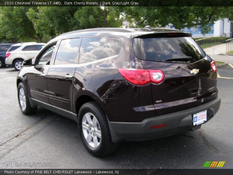 Dark Cherry Metallic / Dark Gray/Light Gray 2010 Chevrolet Traverse LT AWD