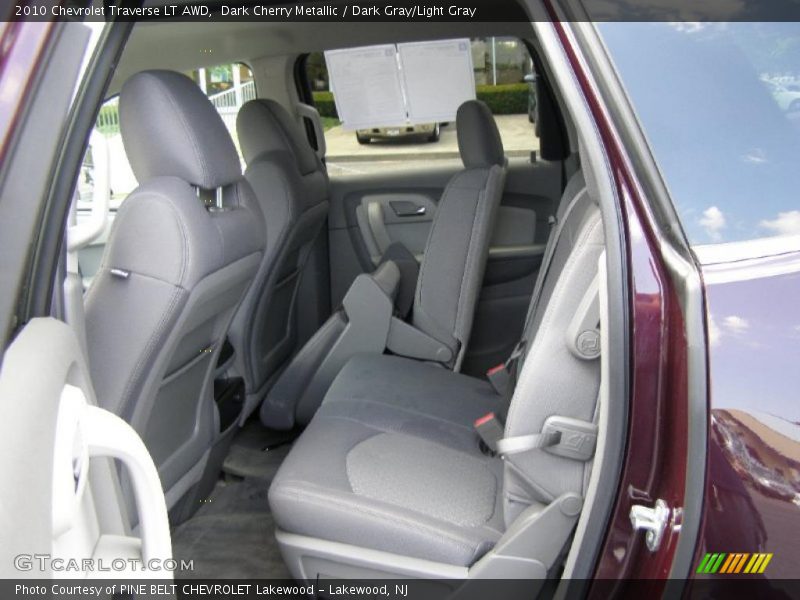 Dark Cherry Metallic / Dark Gray/Light Gray 2010 Chevrolet Traverse LT AWD