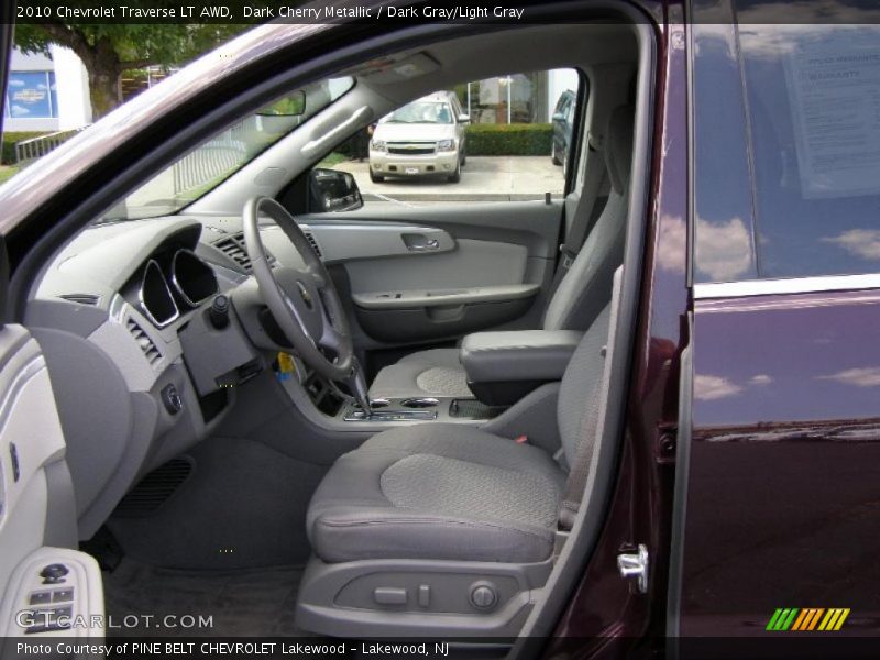 Dark Cherry Metallic / Dark Gray/Light Gray 2010 Chevrolet Traverse LT AWD