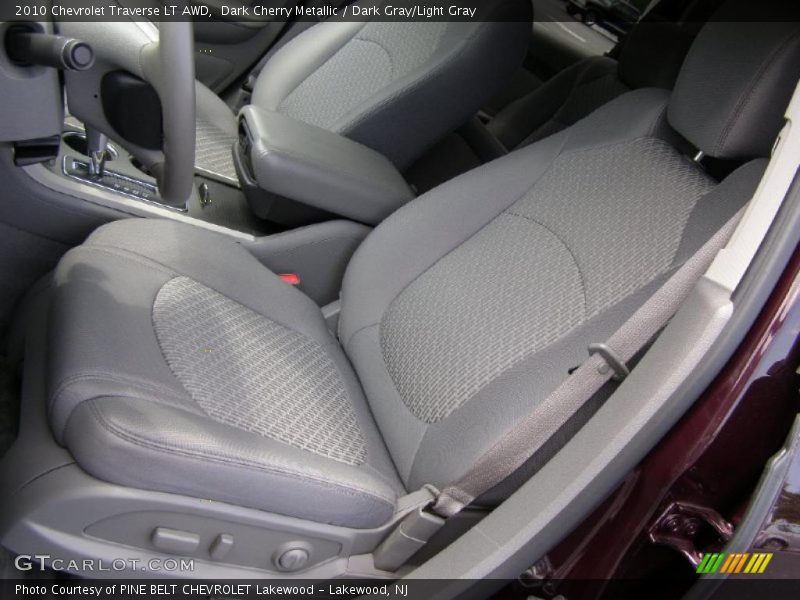 Dark Cherry Metallic / Dark Gray/Light Gray 2010 Chevrolet Traverse LT AWD