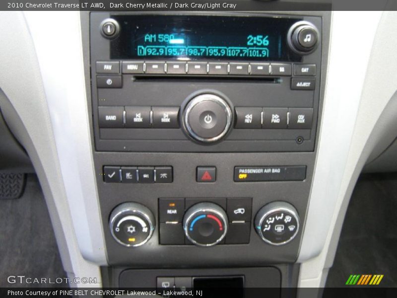 Dark Cherry Metallic / Dark Gray/Light Gray 2010 Chevrolet Traverse LT AWD