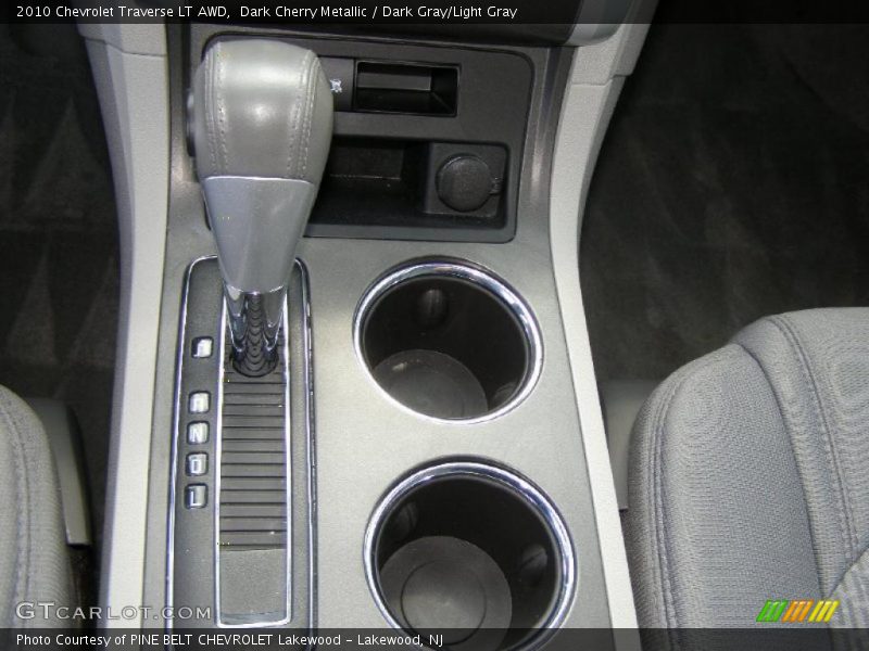 Dark Cherry Metallic / Dark Gray/Light Gray 2010 Chevrolet Traverse LT AWD