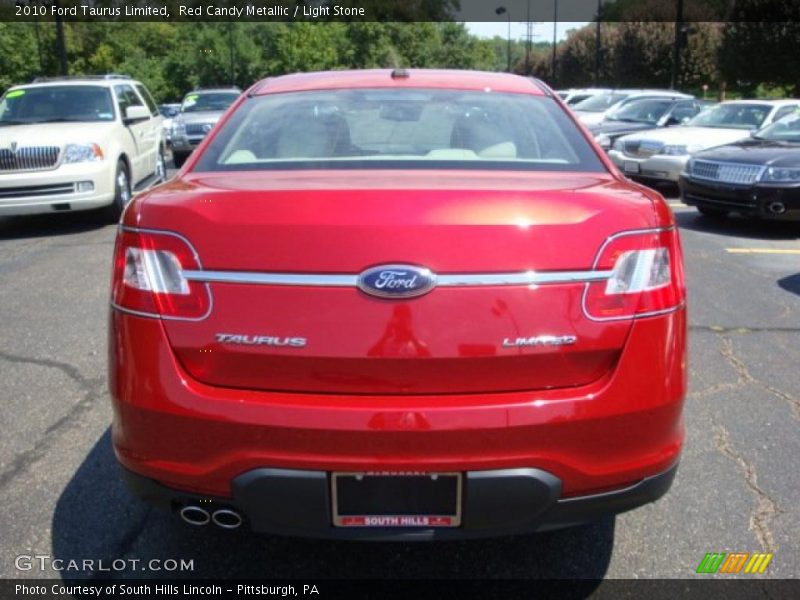 Red Candy Metallic / Light Stone 2010 Ford Taurus Limited