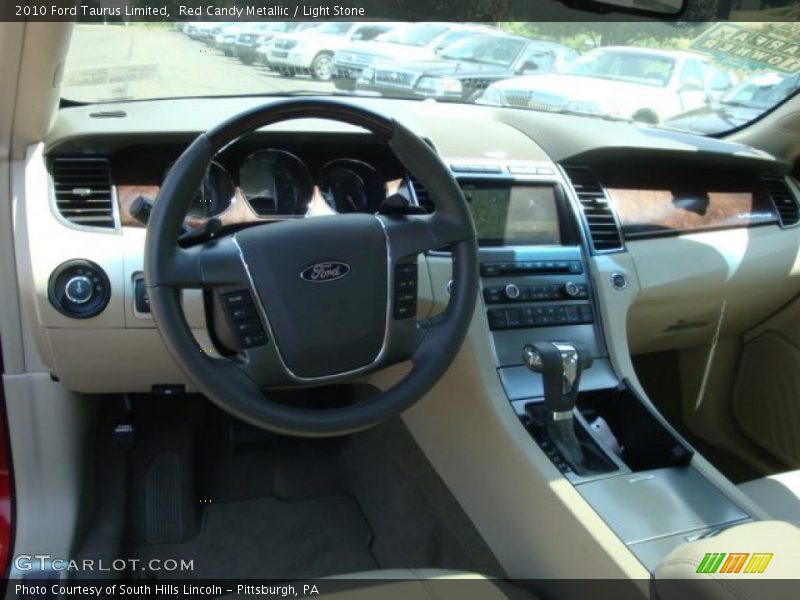 Red Candy Metallic / Light Stone 2010 Ford Taurus Limited