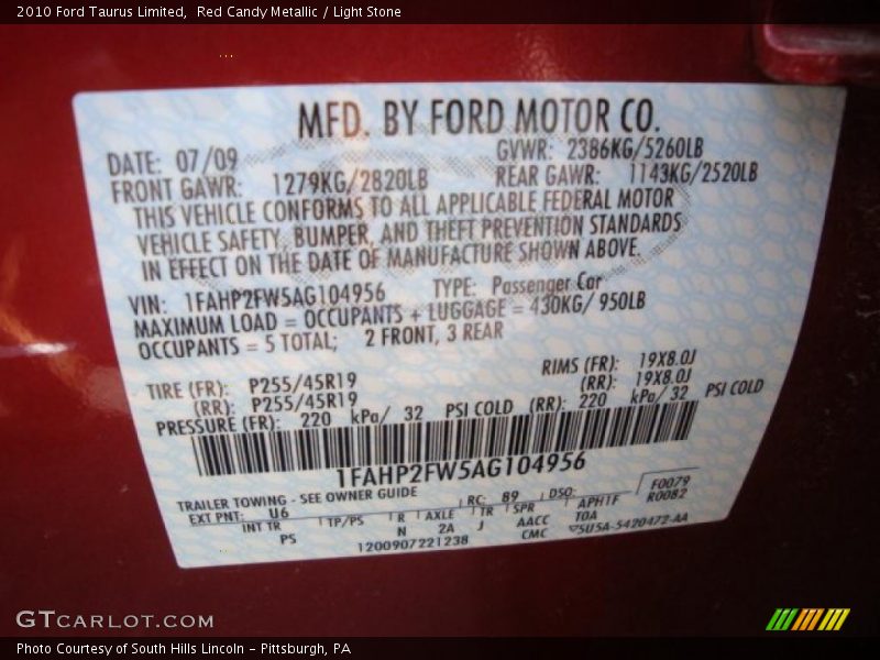 Red Candy Metallic / Light Stone 2010 Ford Taurus Limited