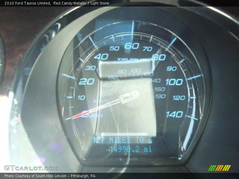Red Candy Metallic / Light Stone 2010 Ford Taurus Limited