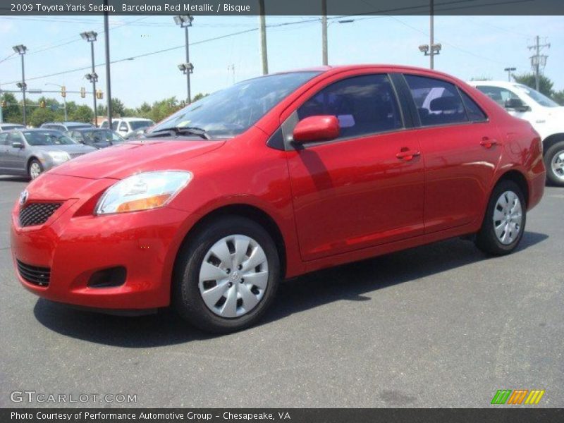 Barcelona Red Metallic / Bisque 2009 Toyota Yaris Sedan
