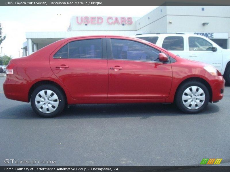 Barcelona Red Metallic / Bisque 2009 Toyota Yaris Sedan
