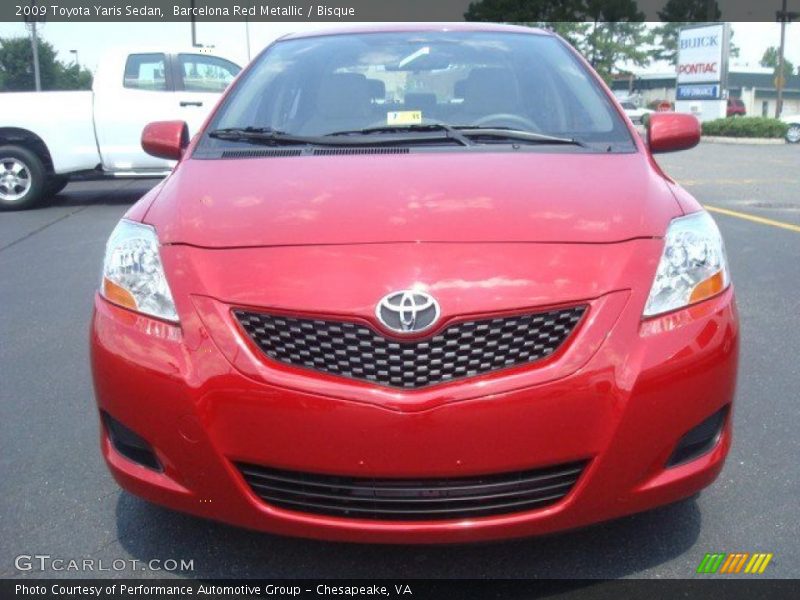 Barcelona Red Metallic / Bisque 2009 Toyota Yaris Sedan