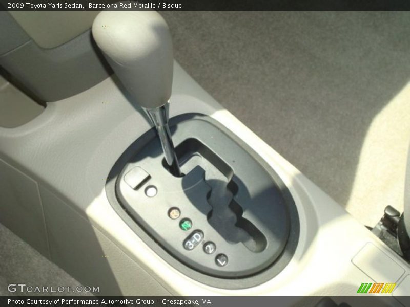 Barcelona Red Metallic / Bisque 2009 Toyota Yaris Sedan