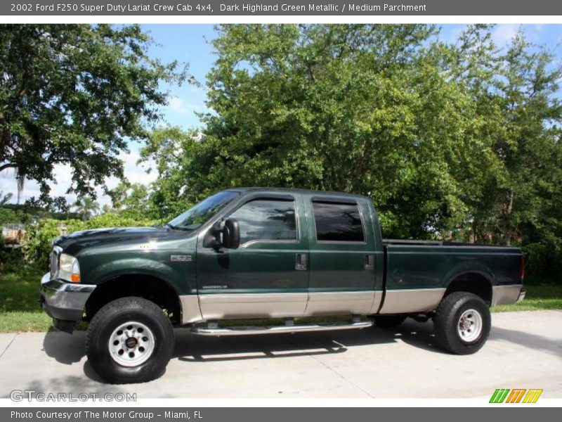 Dark Highland Green Metallic / Medium Parchment 2002 Ford F250 Super Duty Lariat Crew Cab 4x4
