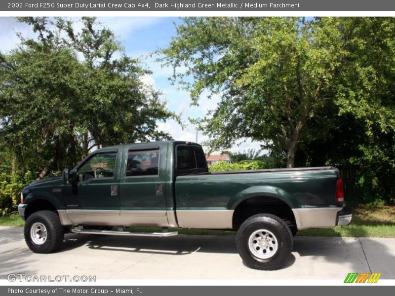 Dark Highland Green Metallic / Medium Parchment 2002 Ford F250 Super Duty Lariat Crew Cab 4x4