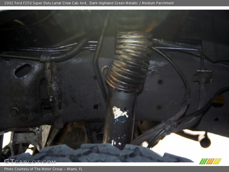 Dark Highland Green Metallic / Medium Parchment 2002 Ford F250 Super Duty Lariat Crew Cab 4x4