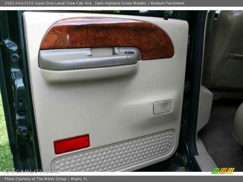 Dark Highland Green Metallic / Medium Parchment 2002 Ford F250 Super Duty Lariat Crew Cab 4x4