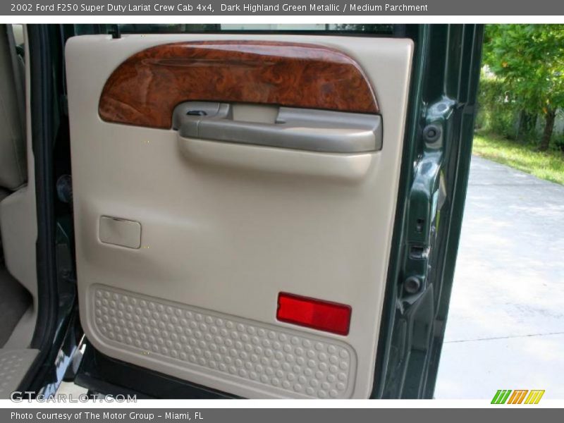 Dark Highland Green Metallic / Medium Parchment 2002 Ford F250 Super Duty Lariat Crew Cab 4x4