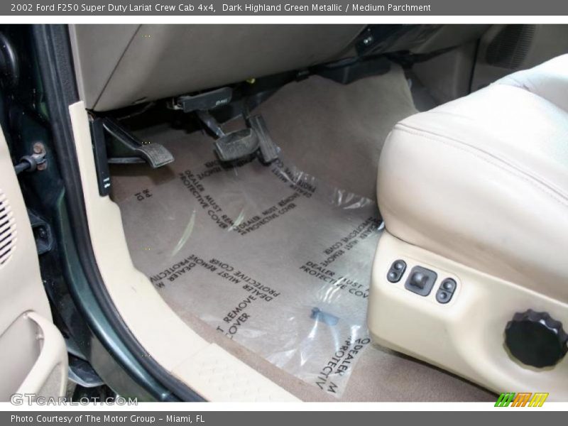 Dark Highland Green Metallic / Medium Parchment 2002 Ford F250 Super Duty Lariat Crew Cab 4x4