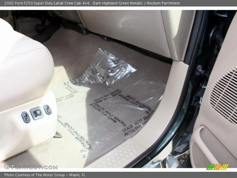 Dark Highland Green Metallic / Medium Parchment 2002 Ford F250 Super Duty Lariat Crew Cab 4x4