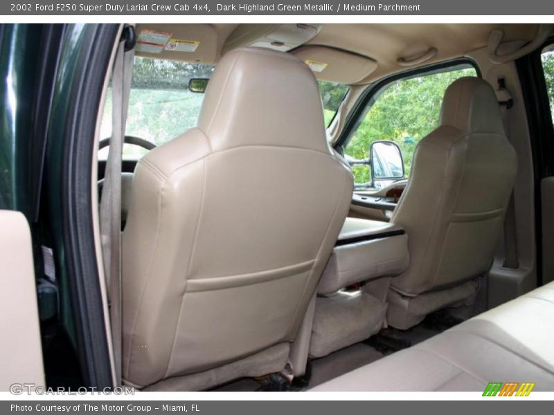 Dark Highland Green Metallic / Medium Parchment 2002 Ford F250 Super Duty Lariat Crew Cab 4x4