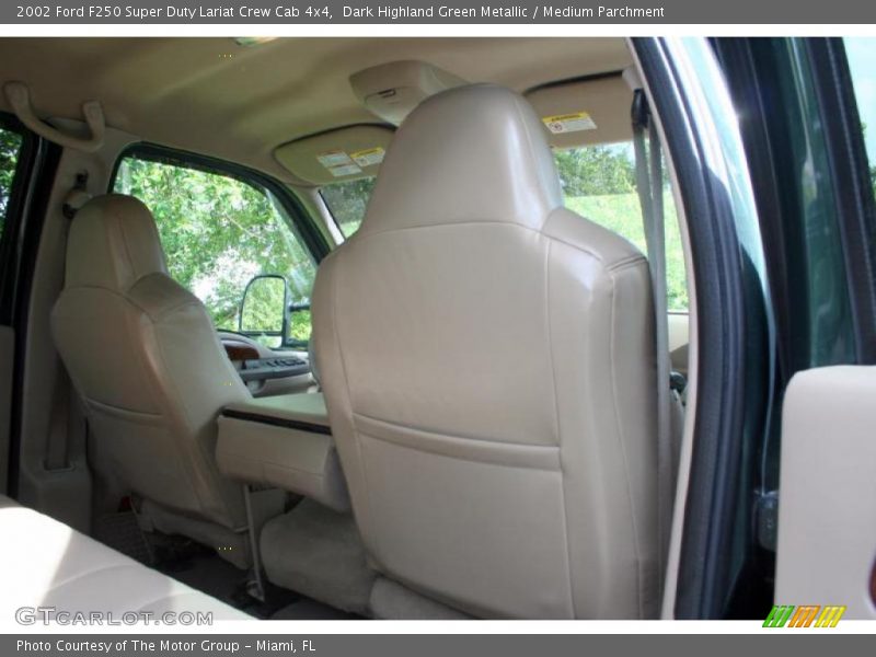 Dark Highland Green Metallic / Medium Parchment 2002 Ford F250 Super Duty Lariat Crew Cab 4x4