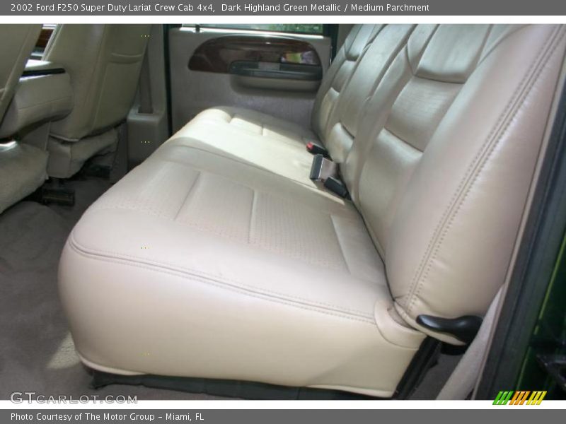 Dark Highland Green Metallic / Medium Parchment 2002 Ford F250 Super Duty Lariat Crew Cab 4x4