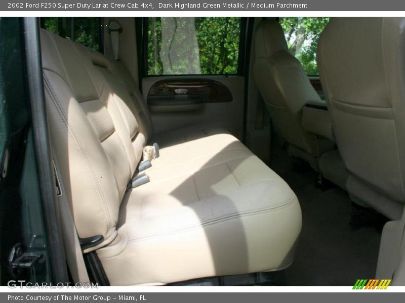 Dark Highland Green Metallic / Medium Parchment 2002 Ford F250 Super Duty Lariat Crew Cab 4x4