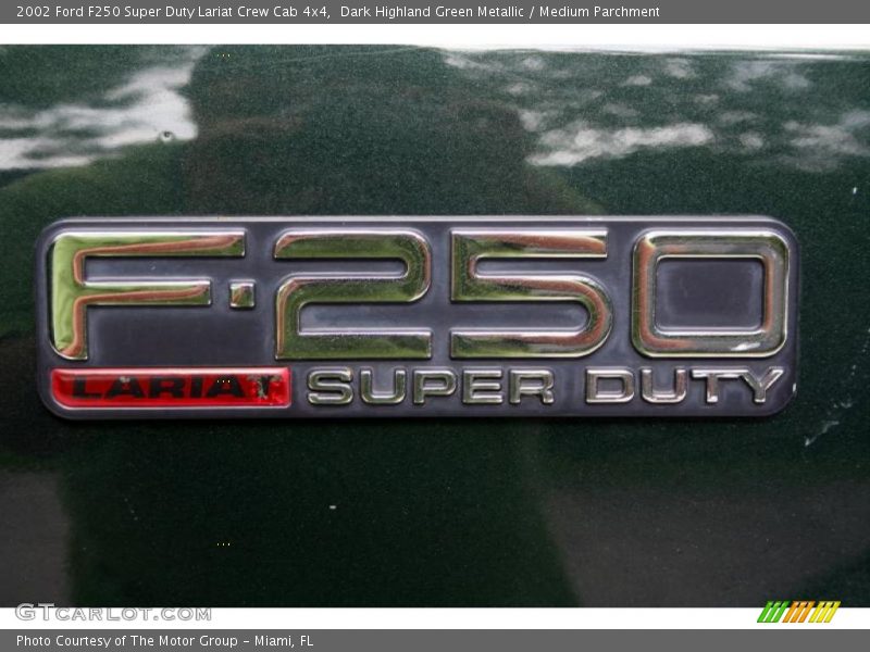 Dark Highland Green Metallic / Medium Parchment 2002 Ford F250 Super Duty Lariat Crew Cab 4x4