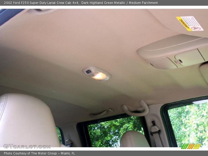 Dark Highland Green Metallic / Medium Parchment 2002 Ford F250 Super Duty Lariat Crew Cab 4x4
