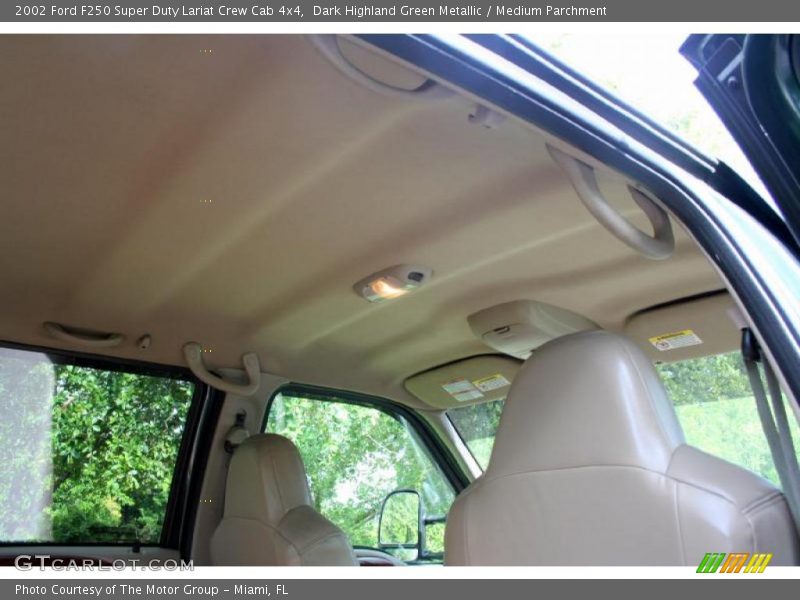Dark Highland Green Metallic / Medium Parchment 2002 Ford F250 Super Duty Lariat Crew Cab 4x4