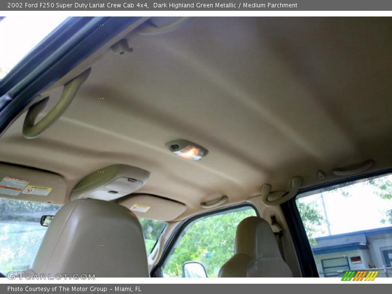 Dark Highland Green Metallic / Medium Parchment 2002 Ford F250 Super Duty Lariat Crew Cab 4x4
