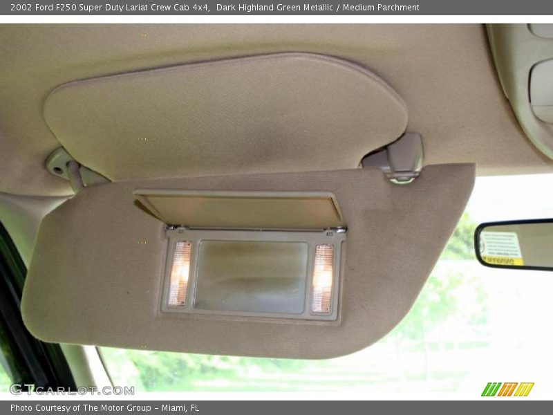 Dark Highland Green Metallic / Medium Parchment 2002 Ford F250 Super Duty Lariat Crew Cab 4x4