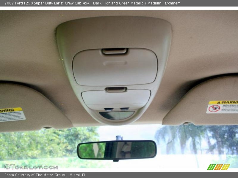 Dark Highland Green Metallic / Medium Parchment 2002 Ford F250 Super Duty Lariat Crew Cab 4x4