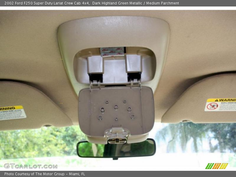 Dark Highland Green Metallic / Medium Parchment 2002 Ford F250 Super Duty Lariat Crew Cab 4x4