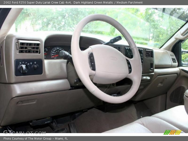 Dark Highland Green Metallic / Medium Parchment 2002 Ford F250 Super Duty Lariat Crew Cab 4x4