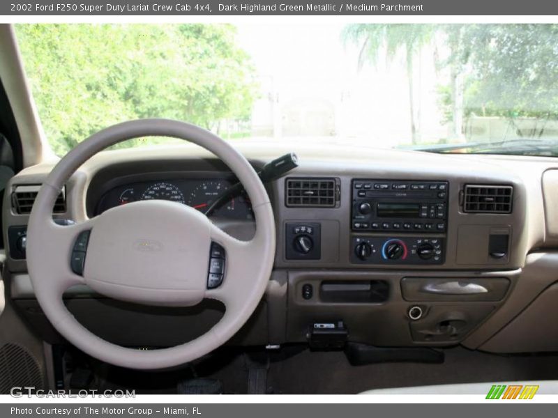 Dark Highland Green Metallic / Medium Parchment 2002 Ford F250 Super Duty Lariat Crew Cab 4x4