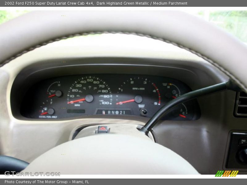 Dark Highland Green Metallic / Medium Parchment 2002 Ford F250 Super Duty Lariat Crew Cab 4x4