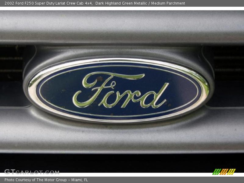 Dark Highland Green Metallic / Medium Parchment 2002 Ford F250 Super Duty Lariat Crew Cab 4x4