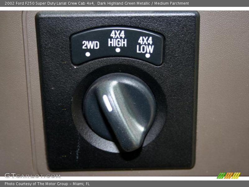 Dark Highland Green Metallic / Medium Parchment 2002 Ford F250 Super Duty Lariat Crew Cab 4x4
