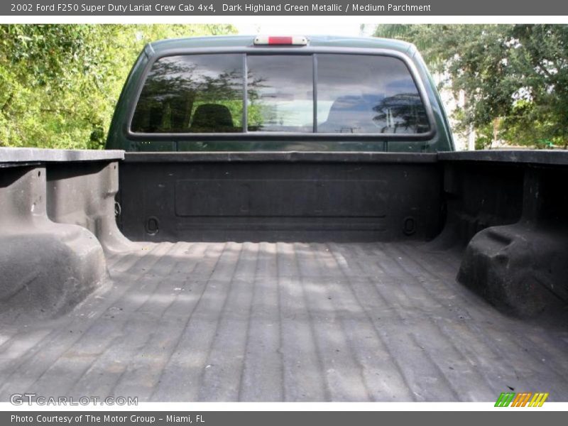 Dark Highland Green Metallic / Medium Parchment 2002 Ford F250 Super Duty Lariat Crew Cab 4x4