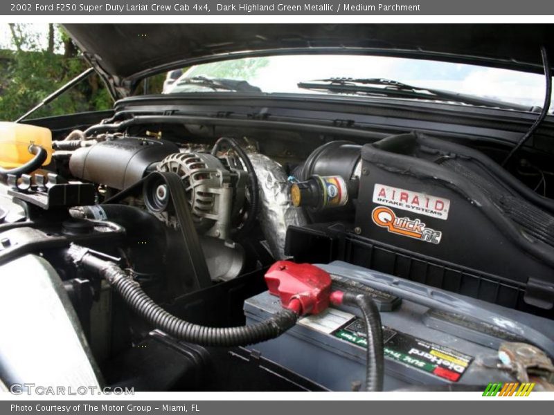 Dark Highland Green Metallic / Medium Parchment 2002 Ford F250 Super Duty Lariat Crew Cab 4x4