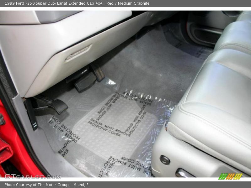 Red / Medium Graphite 1999 Ford F250 Super Duty Lariat Extended Cab 4x4