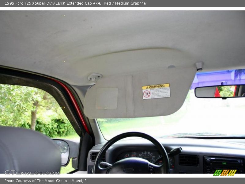 Red / Medium Graphite 1999 Ford F250 Super Duty Lariat Extended Cab 4x4