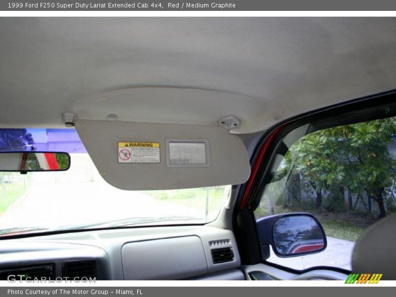 Red / Medium Graphite 1999 Ford F250 Super Duty Lariat Extended Cab 4x4