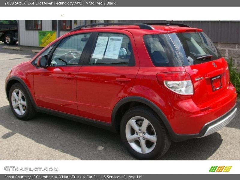 Vivid Red / Black 2009 Suzuki SX4 Crossover Technology AWD