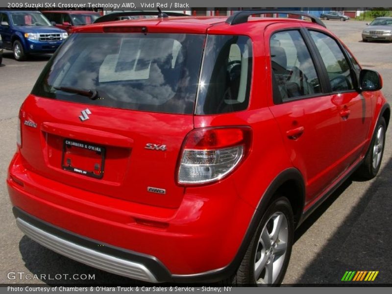 Vivid Red / Black 2009 Suzuki SX4 Crossover Technology AWD