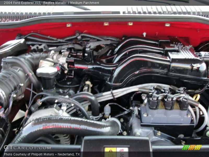 Redfire Metallic / Medium Parchment 2004 Ford Explorer XLS