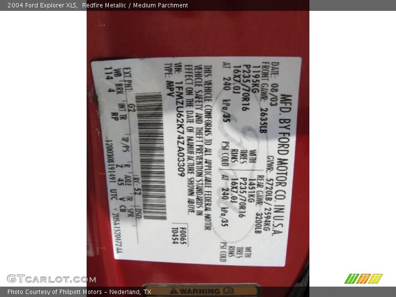 Redfire Metallic / Medium Parchment 2004 Ford Explorer XLS