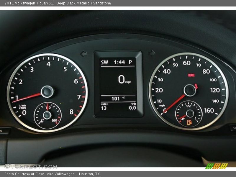 Deep Black Metallic / Sandstone 2011 Volkswagen Tiguan SE