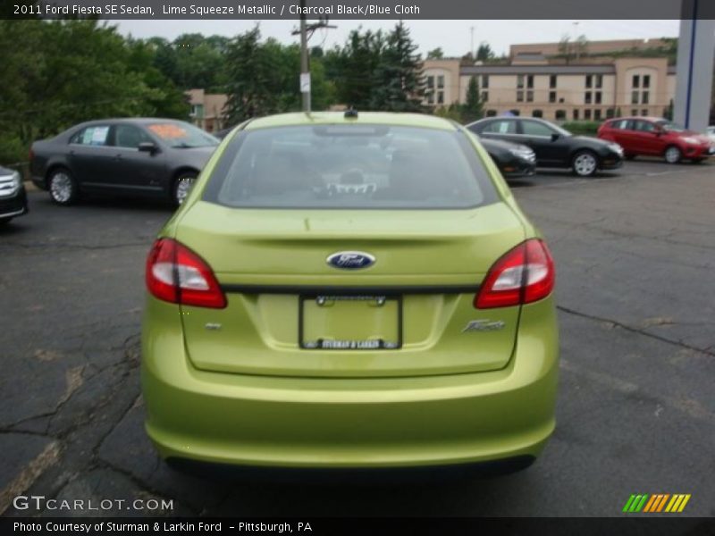 Lime Squeeze Metallic / Charcoal Black/Blue Cloth 2011 Ford Fiesta SE Sedan