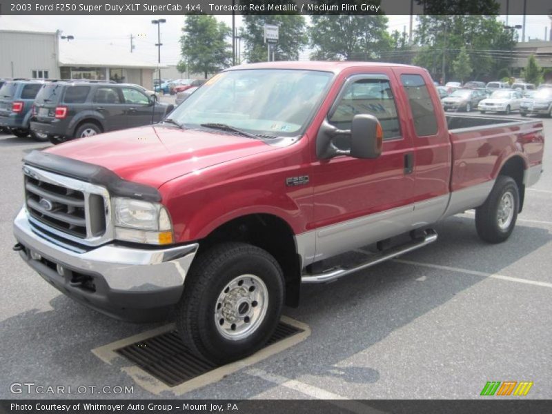 Toreador Red Metallic / Medium Flint Grey 2003 Ford F250 Super Duty XLT SuperCab 4x4